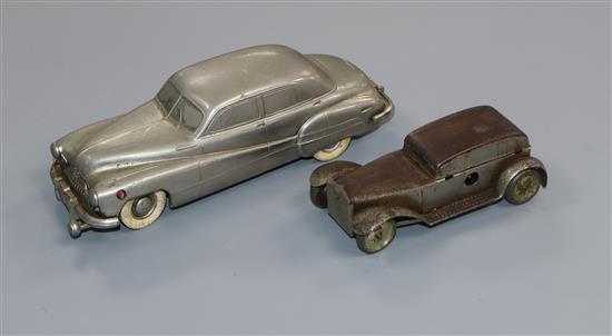 A Prameta clockwork Buick and one other clockwork car